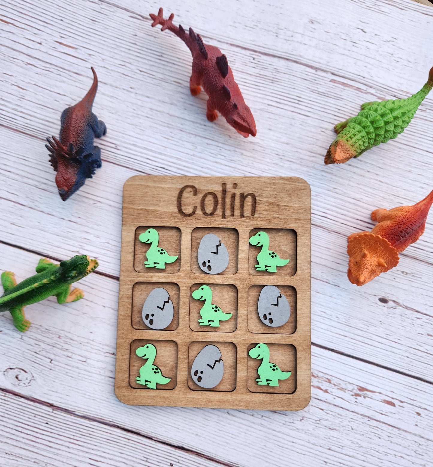 Dinosaur tic tac toe board game