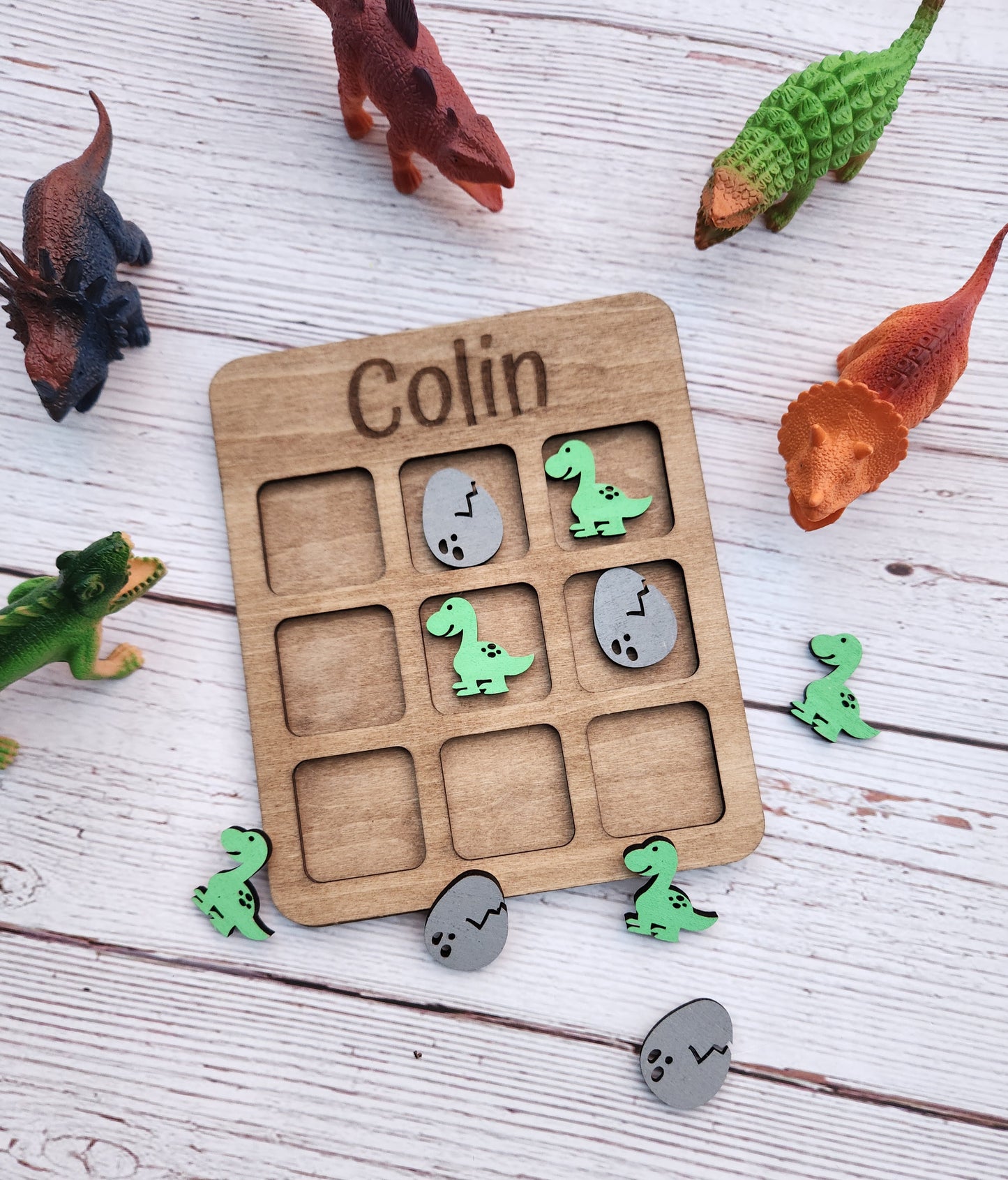 Dinosaur tic tac toe board game