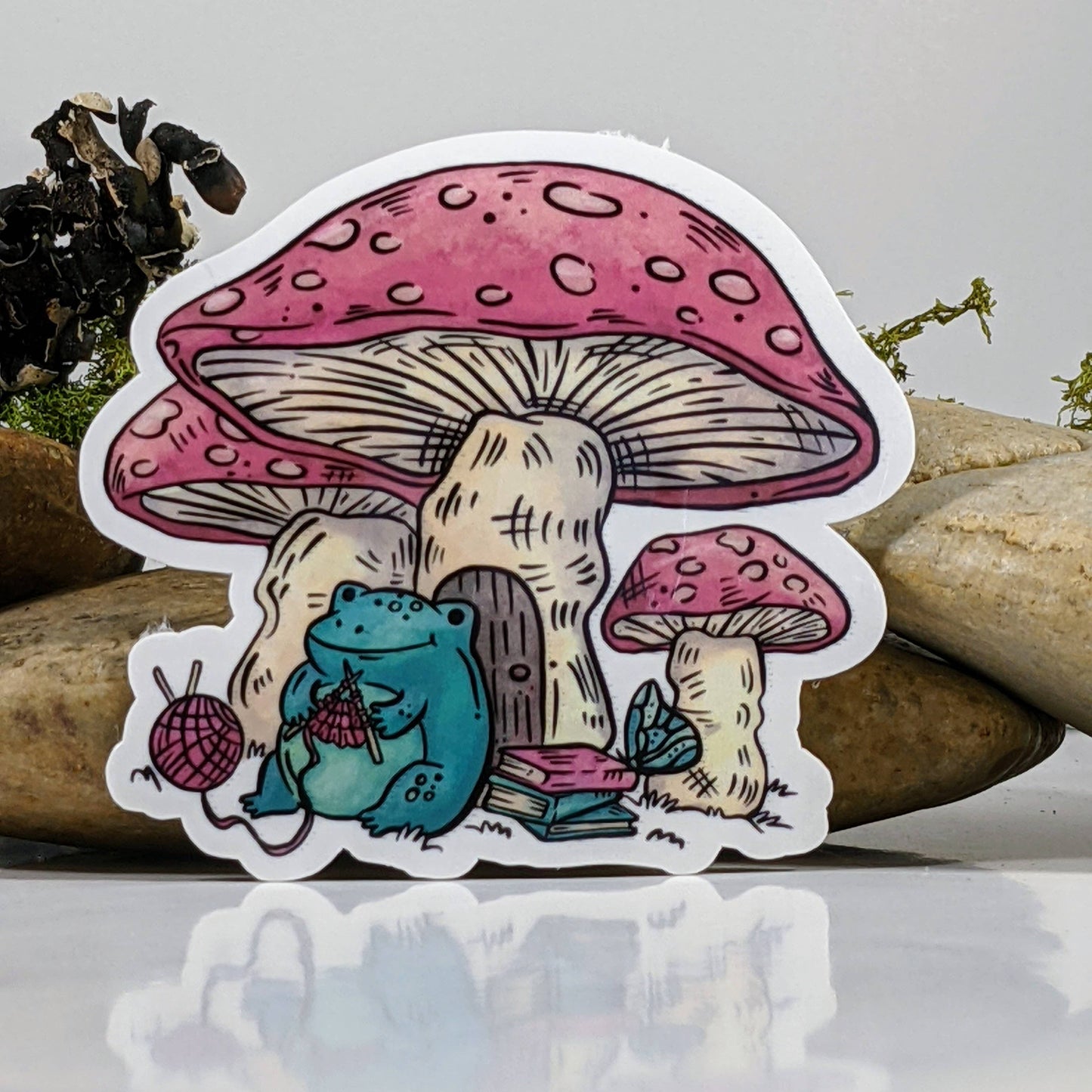 Frog Knitting Under Mushroom Cap Sticker